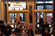 Customers visit the very busy Borders store at Broadway and Wall Street in Manhattan.