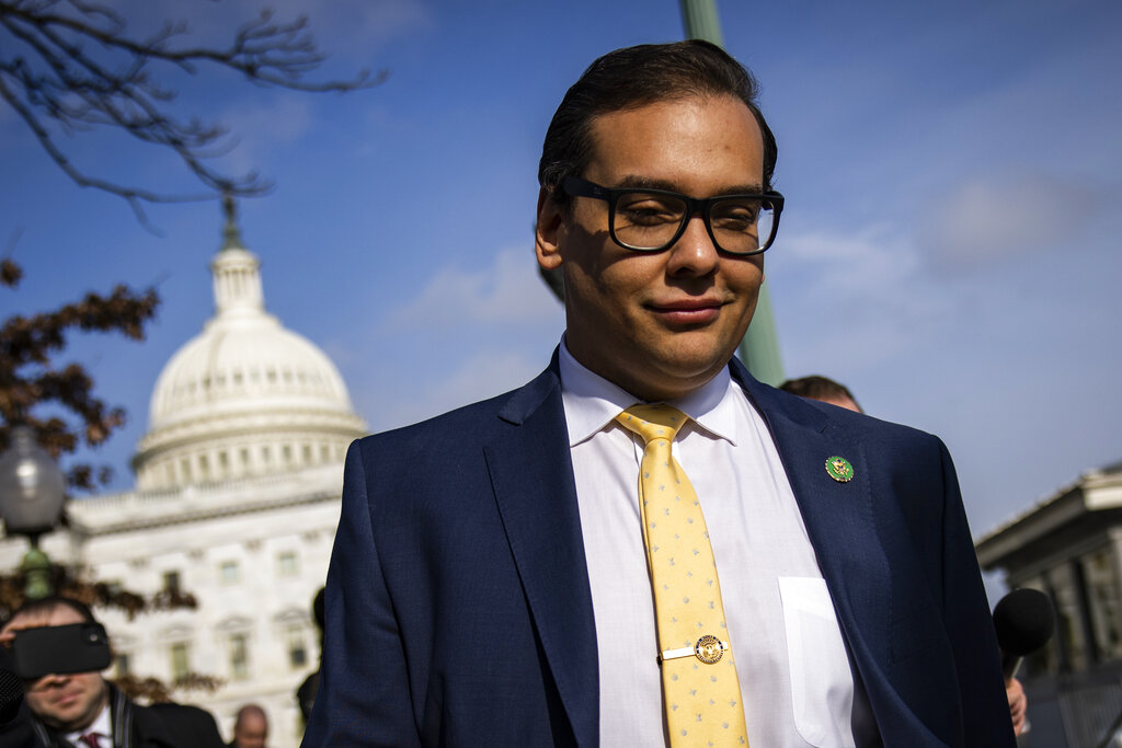 News Quiz: George Santos, Alec Baldwin, & Davos