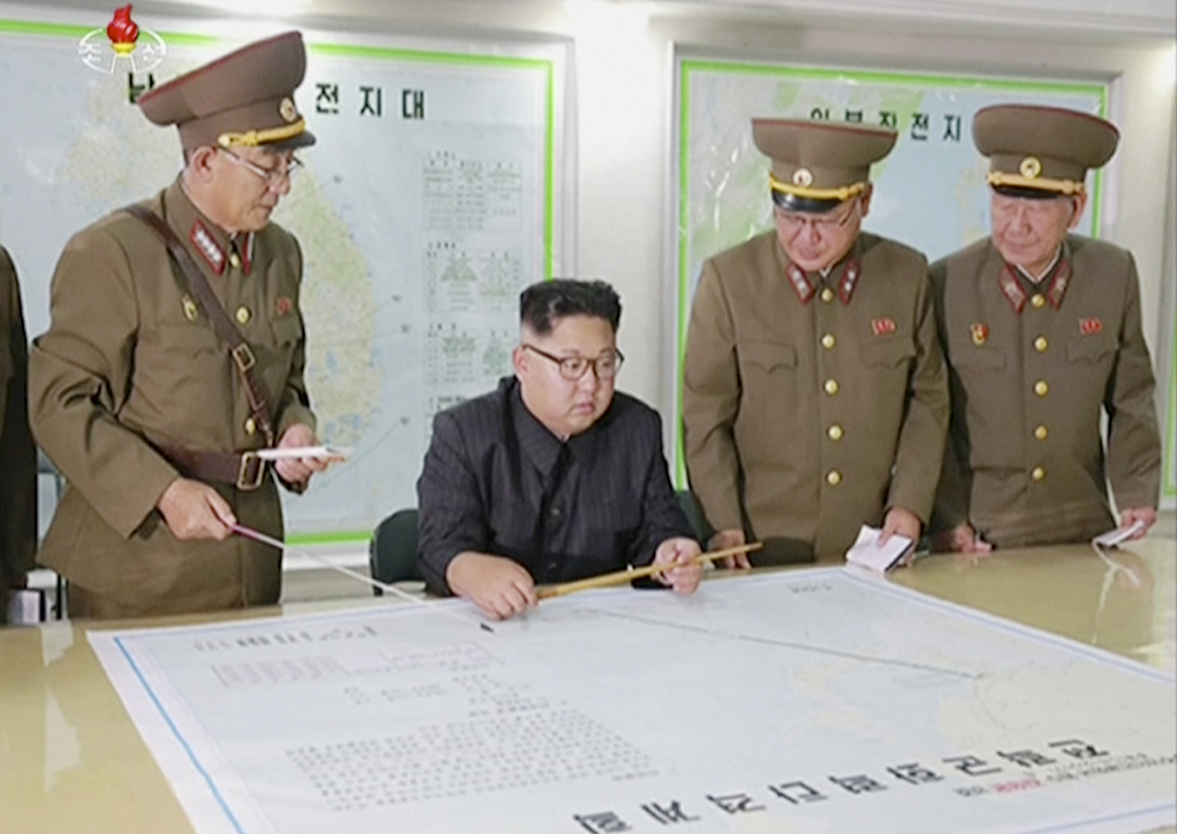 North Korean ruler stands down on threat to Guam