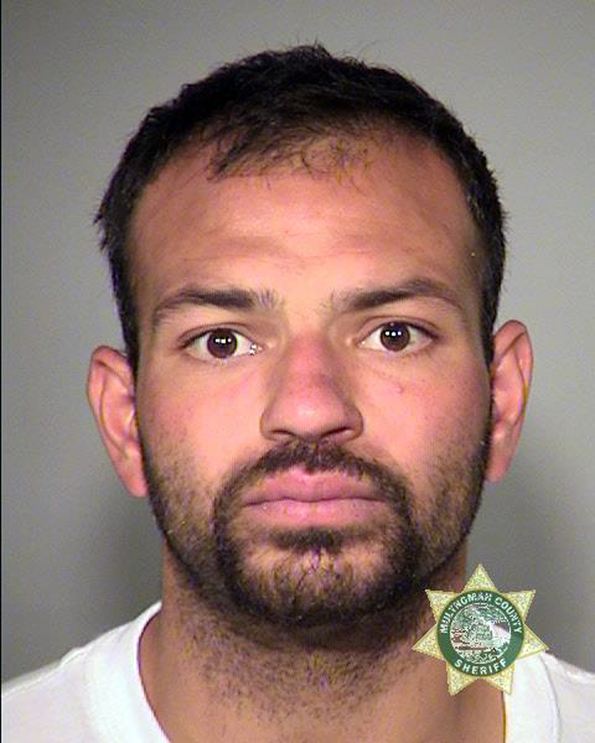 Mexican man convicted of kidnapping and sexually abusing two Oregon women GRINS in court - as it emerges he'd already been deported TWENTY times before