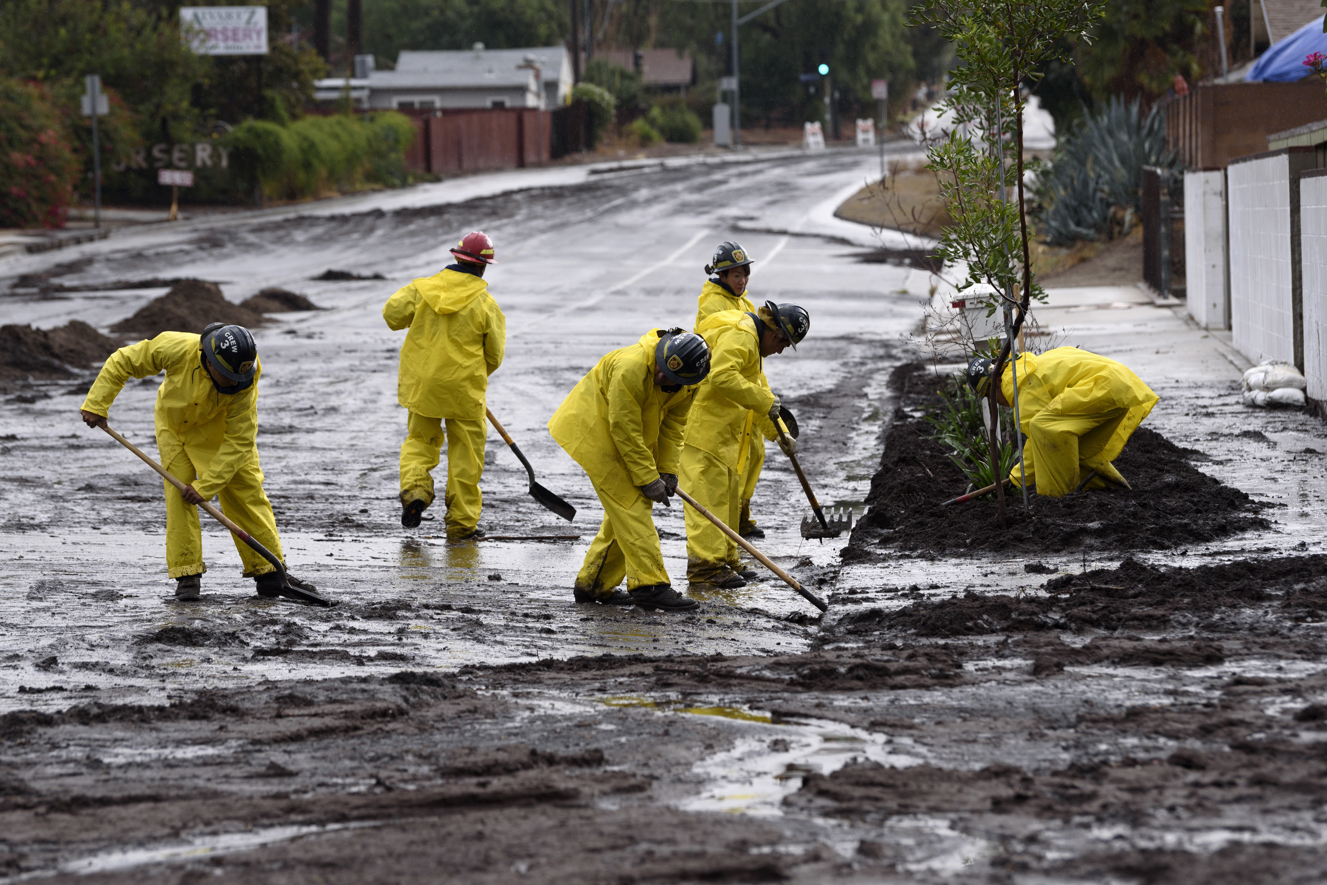 At least 13 dead as heavy rains trigger flooding, mudflows and freeway closures across Southern California