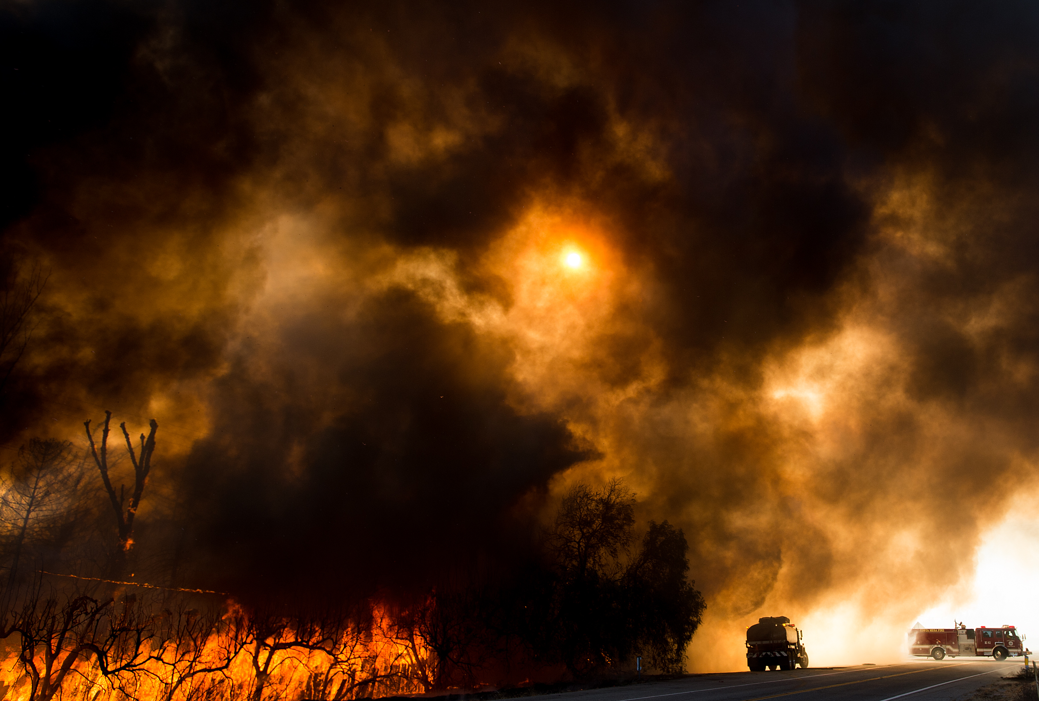 'Out of control' Southern California fire explodes overnight, forcing thousands to flee
