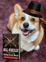 Getting ready for turkey! A good book is a must this weekend for Corgis.