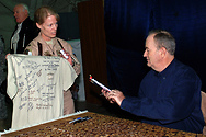 One of the troops presents Bill with a signed t-shirt.