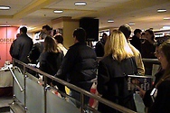 Customers line up to meet Bill and to have him sign their copies of 