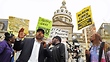 Baltimore protesters march again after police file sealed report on Gray